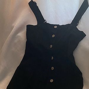 H&M black denim dress with adjustable straps. Makes waist look smaller.